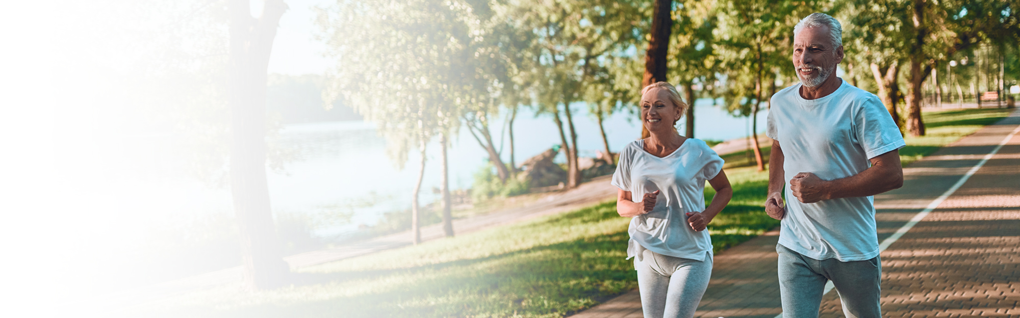 middle-aged couple running