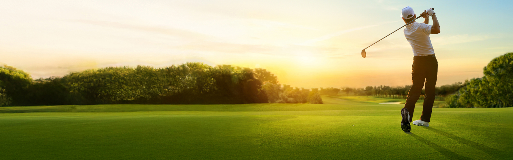 golfer swinging club